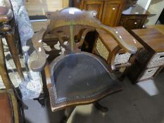 An old oak revolving desk chair