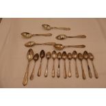 A set of six 800 silver tea spoons with a set of six larger spoons marked 800. Also with four plate