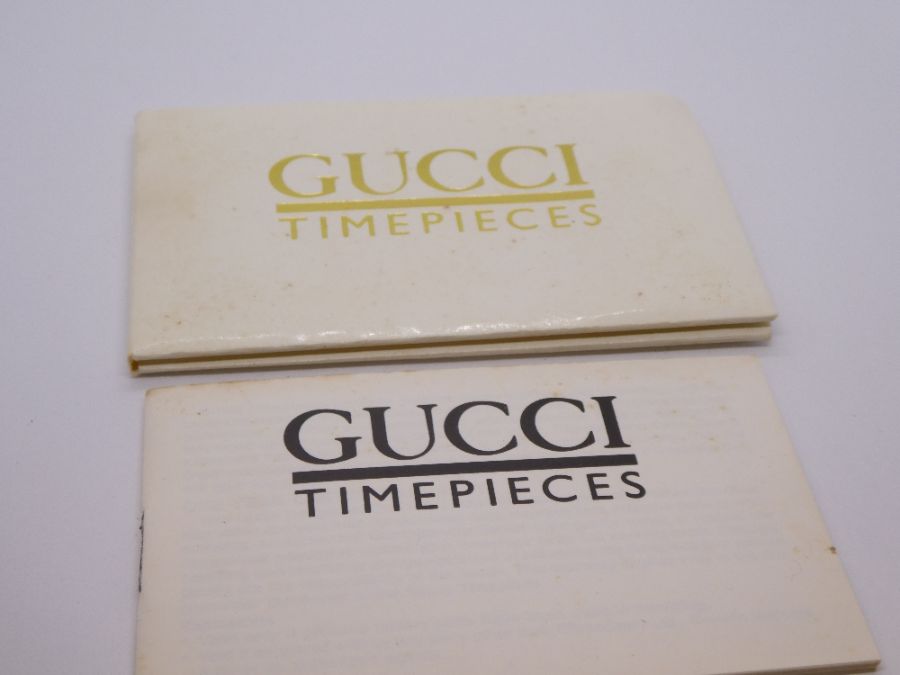 Cased 'Gucci' wristwatch on black leather strap, purchased 1988 - Image 8 of 8