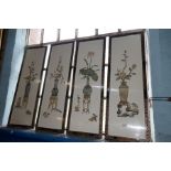 A set of four oriental wall plaques decorated vases and flowers