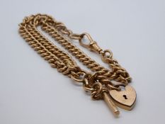 Antique Rose gold watch chain fashioned into a necklace, hung with heart shaped gold plated pendant