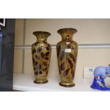 A large pair of Doulton stoneware vases of leaf design, 41cm - one of the vases has a repair at th