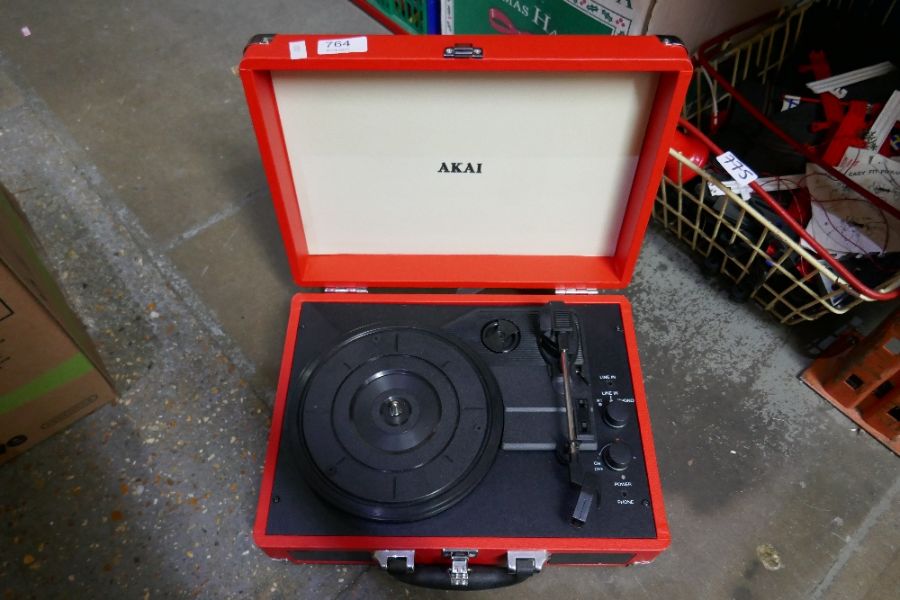 Cased Westminster portable gramophone, Red Cased Akai example and another
