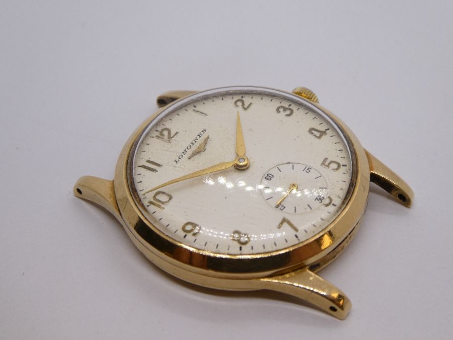 A 9ct gold gents LONGINES watch, probably dating from 1950/1960 of large size, winds and ticks - Image 3 of 7