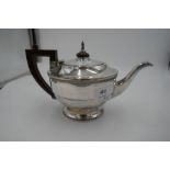 A Birmingham 1934 silver rounded teapot with girdled tapering body on a round, circular foot. Hallma