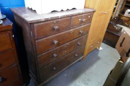 An antique mahogany chest having two short and three long drawers