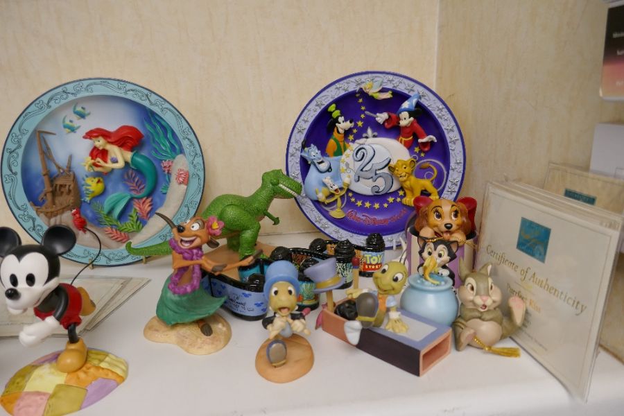 Walt Disney Classics Collection figures from Toy Story, Pinocchio and others and two wall plates