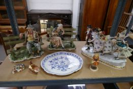 A German porcelain figural group of four skaters, two Royal Crown Derby paperweights and sundry