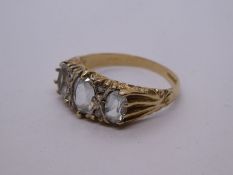 Victorian style 9ct yellow gold blue topaz and diamond trilogy ring, marked 375, Birmingham, size S,