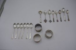 A set of six silver ornate teaspoons hallmarked Sheffield 1929 Thomas Bradbury and Sons. Also with a