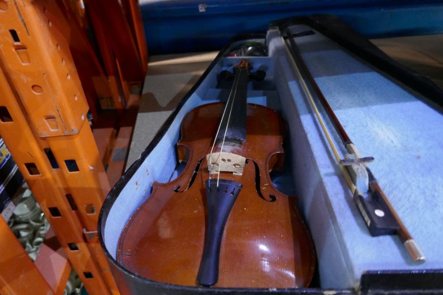 Two vintage cased violins