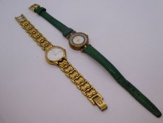 Gucci, a cased Gucci Ladies wristwatch on a green leather strap, together with a cased Tissot exampl