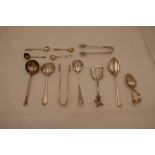 A quantity of silver flatware to include a silver Victorian windmill spoon Sheffield 1900 with the i