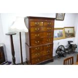 A 19th century mahogany chest on desk with fluted canted corners, mahogany lined drawers, on bracket