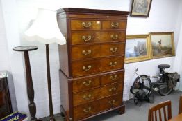A 19th century mahogany chest on desk with fluted canted corners, mahogany lined drawers, on bracket