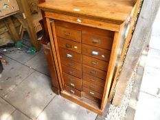 An old oak filing chest having two rows of drawers (A/F)