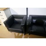 A modern black leather two seat settee with matching armchairs