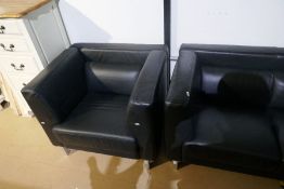 A modern black leather two seat settee with matching armchairs