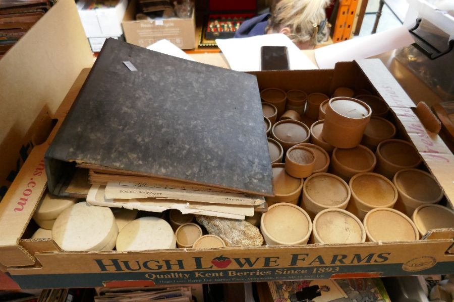 Crate of Geological specimens and a folder showing the origin of samples