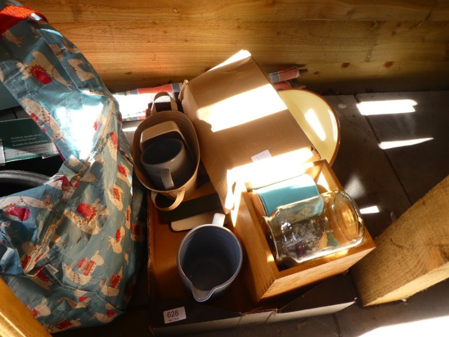 A bag containing tools, some sets of taps and a tray of sundry