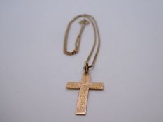 10K yellow gold box chain, marked 10K hung with a 9ct engraved cross, marked 9ct, 3.7g approx