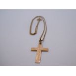 10K yellow gold box chain, marked 10K hung with a 9ct engraved cross, marked 9ct, 3.7g approx