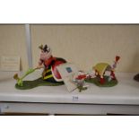 Walt Disney Classics collection, Alice in Wonderland figure of the Queen of Hearts playing golf, car
