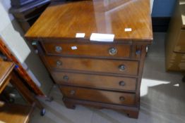 Two standing corner cupboards and a reproduction mahogany Bachelor's chest
