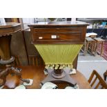 A Victorian mahogany sewing table having fitted top unit drawer and bag drawer under or an hexagonal