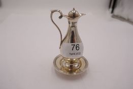 A Victorian silver heavy jug with stopper on a matching silver tray, hallmarked London 1889 Lambert