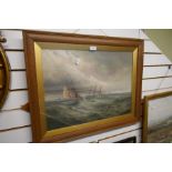 A late 19th century, marine oil painting of boats in stormy seas and one other watercolour of a ligh