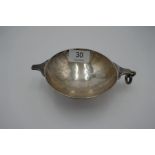 A George V silver Quaich with hammered body in the Arts and Crafts style. Having suspension loop to