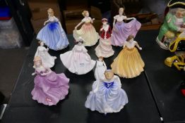 Ten Royal Doulton figures of ladies