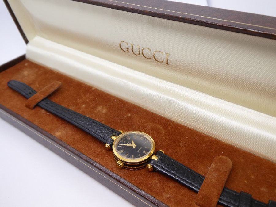 Cased 'Gucci' wristwatch on black leather strap, purchased 1988 - Image 3 of 8