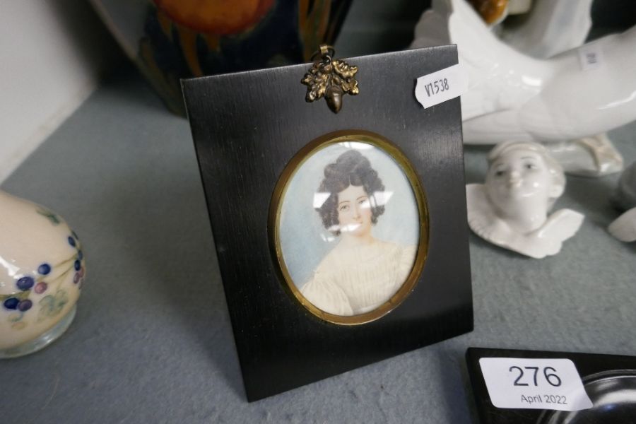 Two miniature portraits of Ladies and one other of bearded man reading book