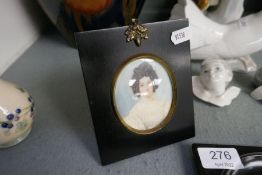 Two miniature portraits of Ladies and one other of bearded man reading book