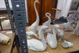 Lladro; a quantity of Swan figures, two Polar Bears and others (9)