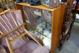 A retro bookcase having sliding doors