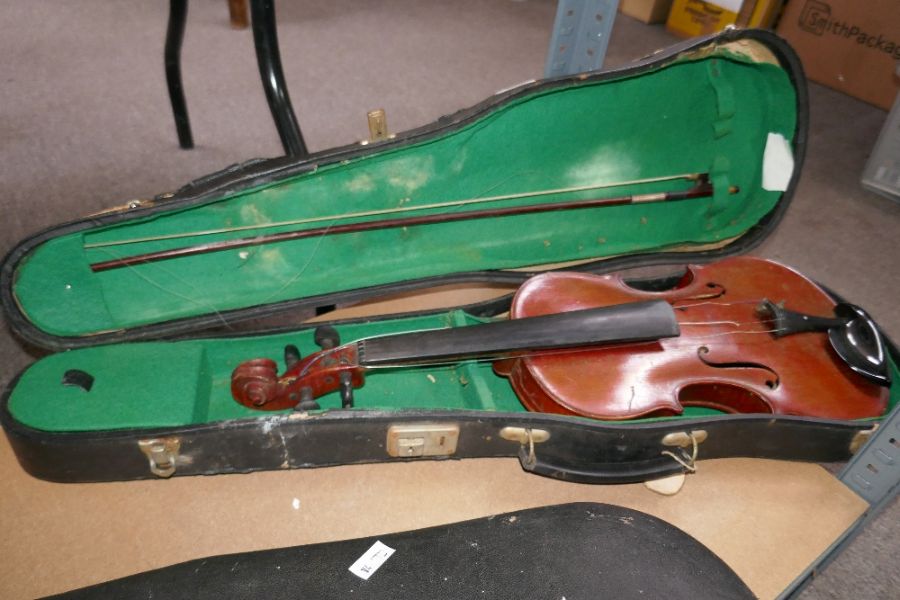 Two old violins with bows, both with cases, plus a Clarinet case (no clarinet)