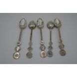 A set of five Chinese silver teaspoons nicely decorated. Possibly by Kwan Wo of Canton of Hong Kong,