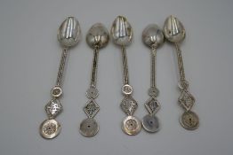 A set of five Chinese silver teaspoons nicely decorated. Possibly by Kwan Wo of Canton of Hong Kong,