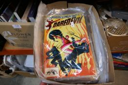 A box of vintage Marvel comics including Spiderman, Daredevil etc