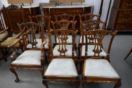 A set of eight reproduction Chippendale style dining chairs to include two with open arms (8)