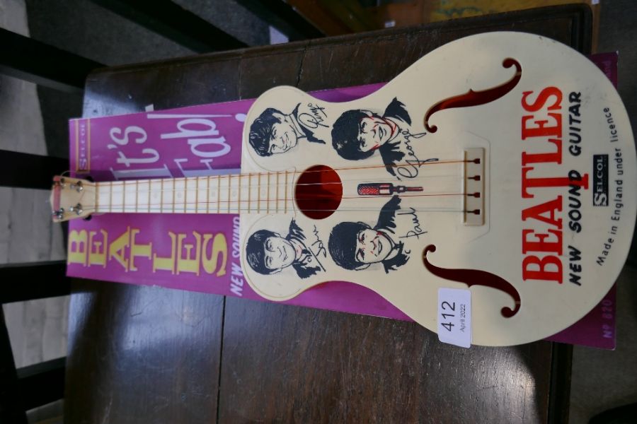 A Selcol Beatles guitar on reproduction cardboard back (guitar length 58cms) - Image 2 of 4