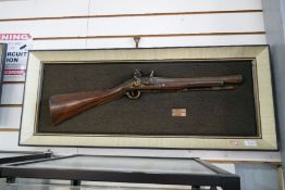 Two similar wall plaques of a Blunderbuss and flintlock pistol