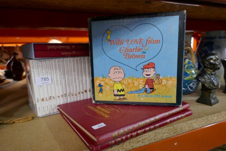 Boxed set of Beatrix Potter stories, Charlie Brown box set, Hollywood album etc, a Golfing print by