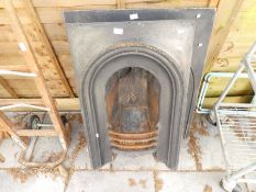 Two similar Victorian cast iron fireplaces