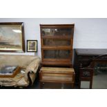 An old oak Globe Wernicke four section bookcase with two additional similar section (6)