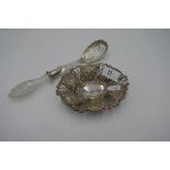 A very nice silver and cut glass handle fruit server with scalloped design. Hallmarked Birmingham 19