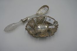 A very nice silver and cut glass handle fruit server with scalloped design. Hallmarked Birmingham 19